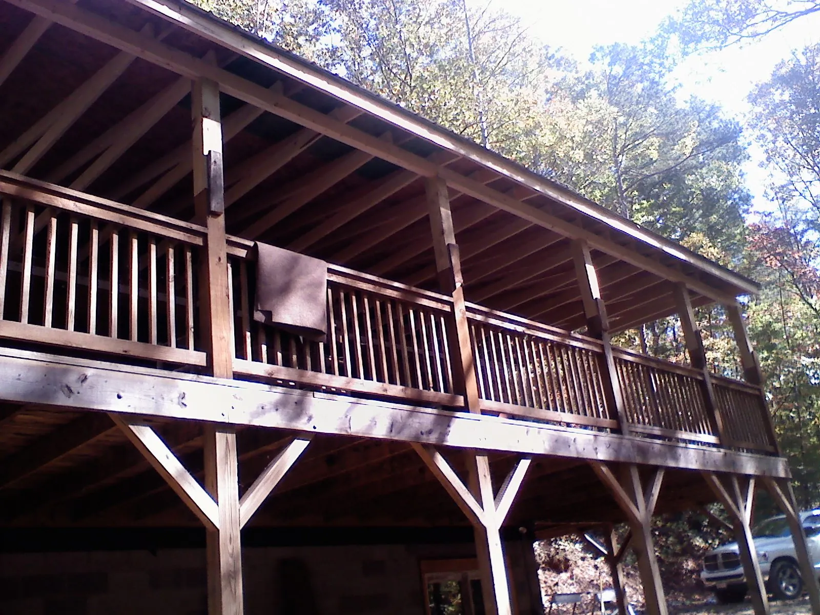 Timber framing under a new elevated porch and deck — Roof Leak Repair in Lincoln City by Roofing Brothers